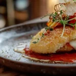 Grouse Parmesan with melted cheese and marinara