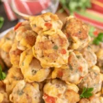 Delicious Rotel cream cheese sausage balls served on a platter at a party