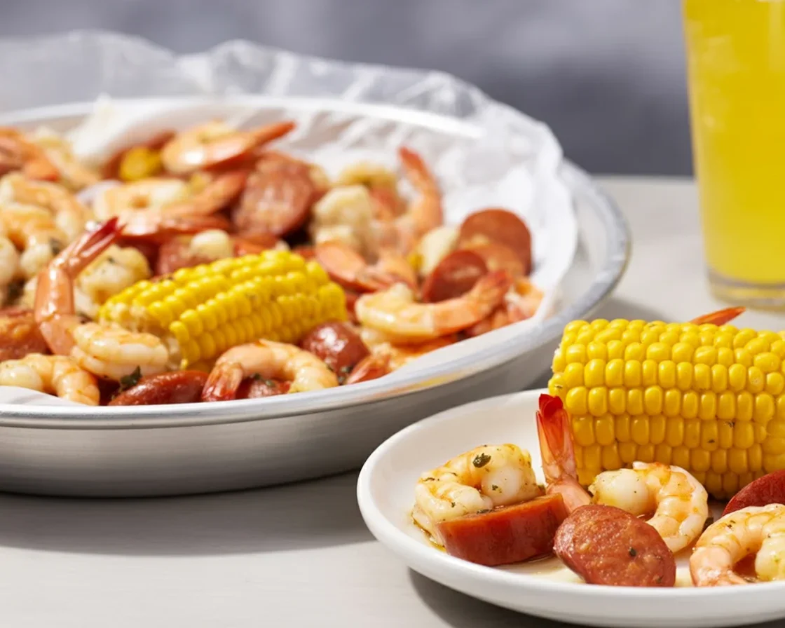 Red Lobster's Seafood Boil featuring shrimp, lobster, and crab legs served hot.